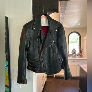 DKNY ladies Moto Jacket.   Never worn.  Non smoking home.   Size L